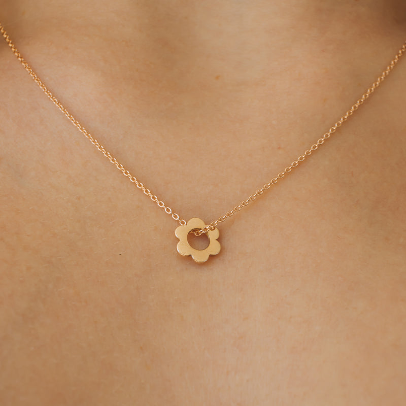9ct gold necklace with a daisy pendant from Mark Whitehorn Goldsmith